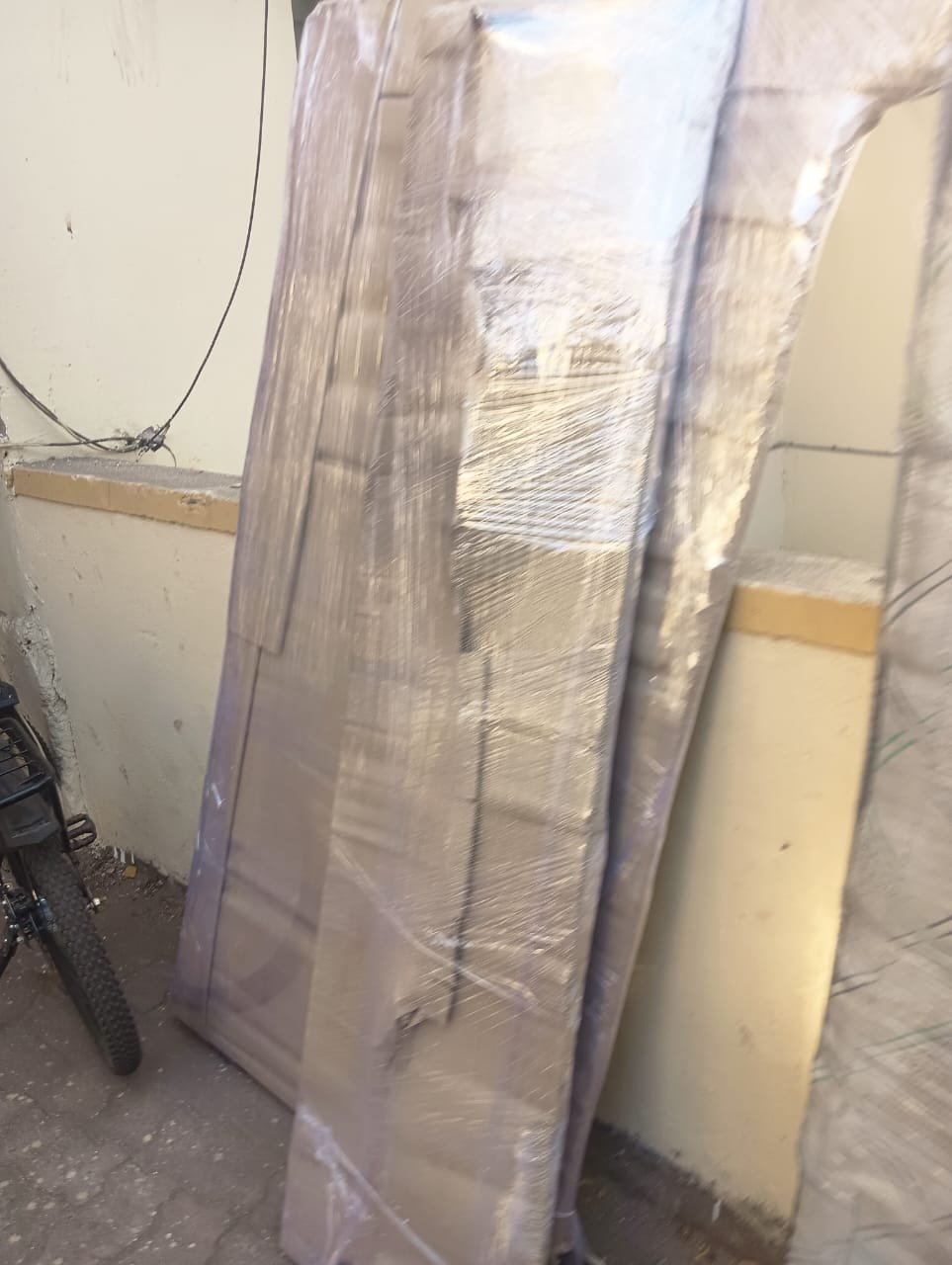 Movers unloading furniture at new house