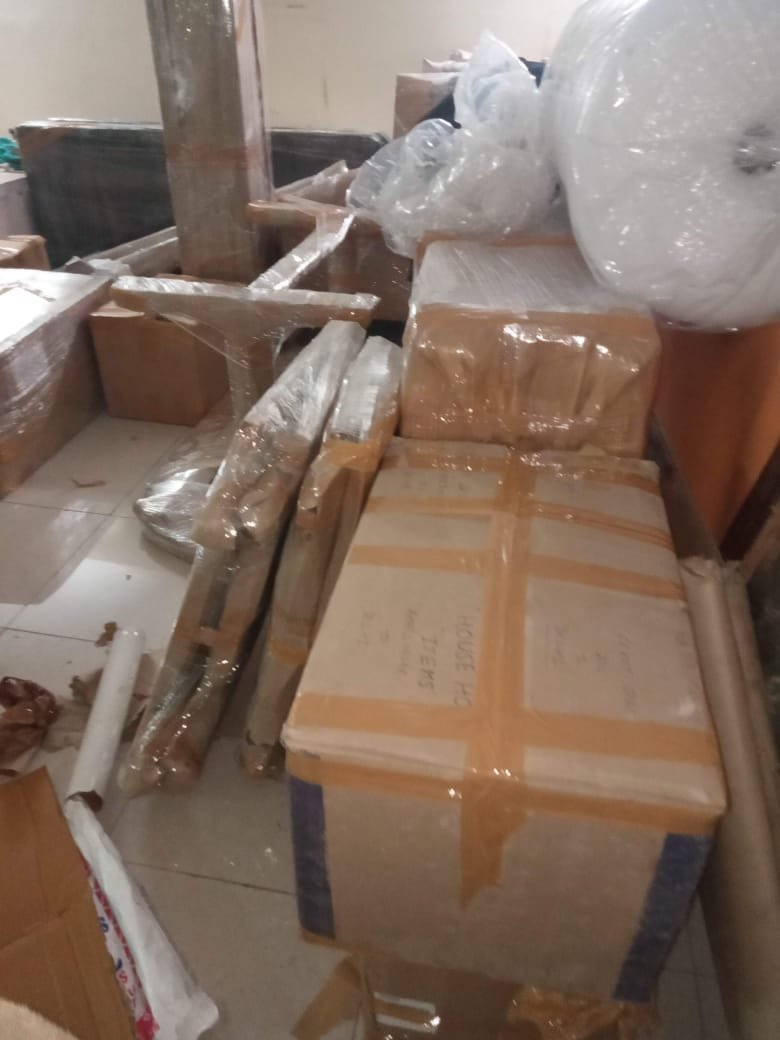 Loading relocation goods into transport vehicle