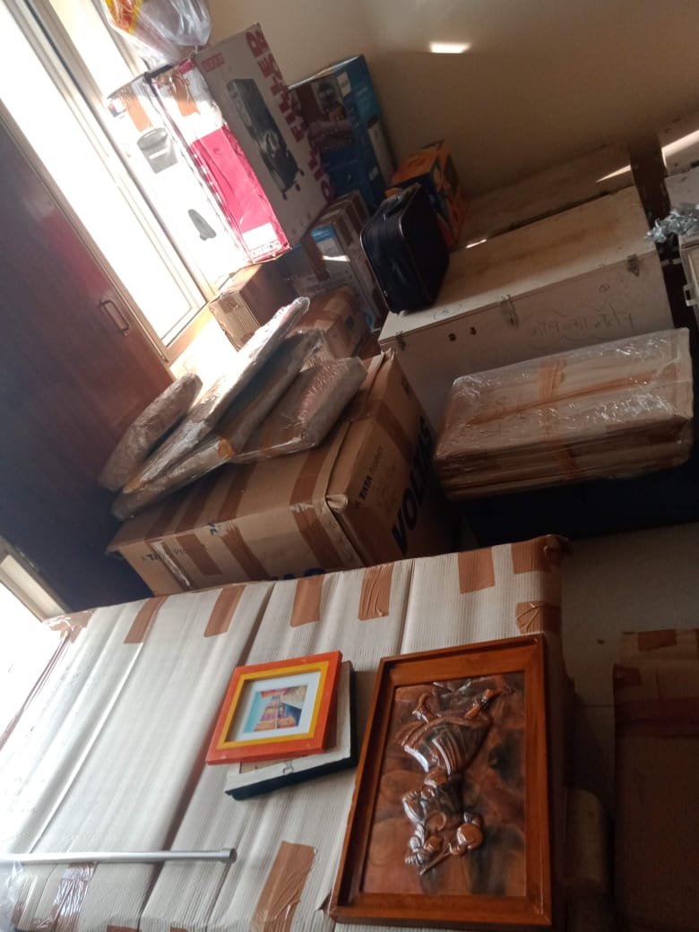 Furniture wrapped in plastic for safe transport